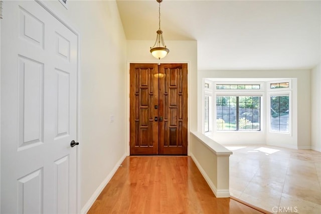 entrance foyer with light wood-type flooring