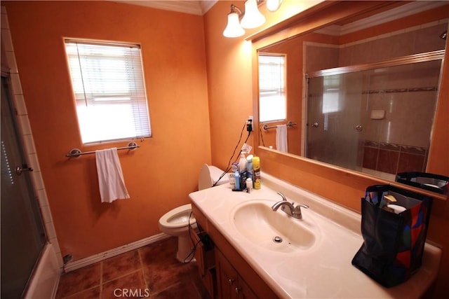 bathroom with tile patterned flooring, vanity, and toilet