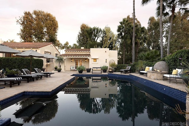 view of swimming pool featuring a patio