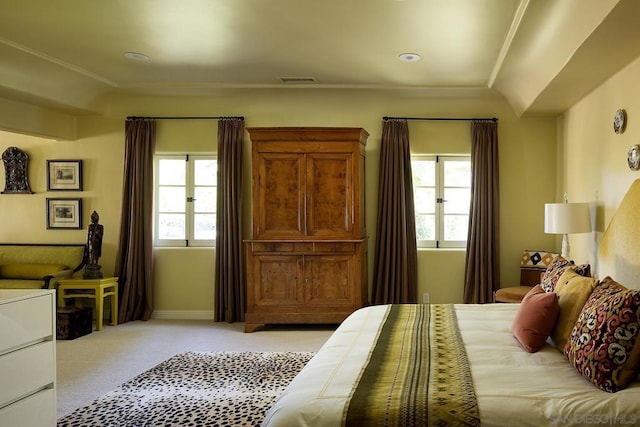 carpeted bedroom featuring ornamental molding