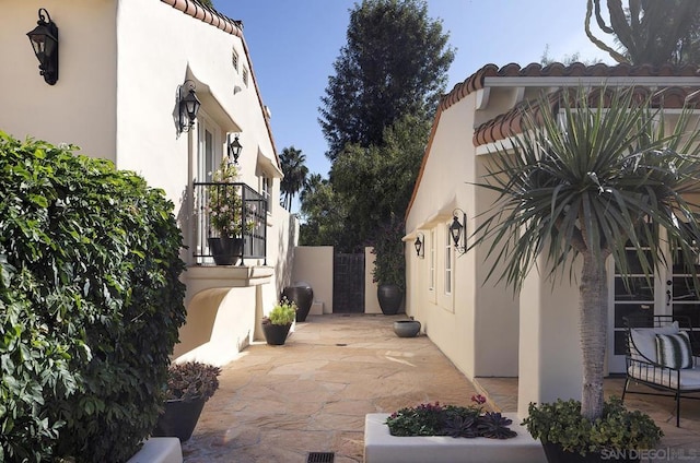 view of home's exterior featuring a patio