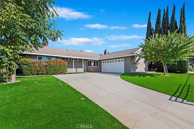 ranch-style home with a front lawn and a garage