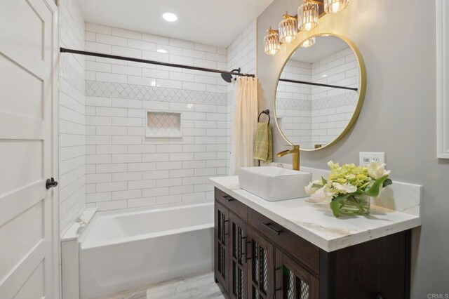 bathroom with vanity and shower / bath combo