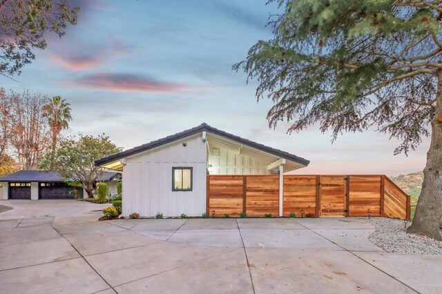 view of property exterior at dusk