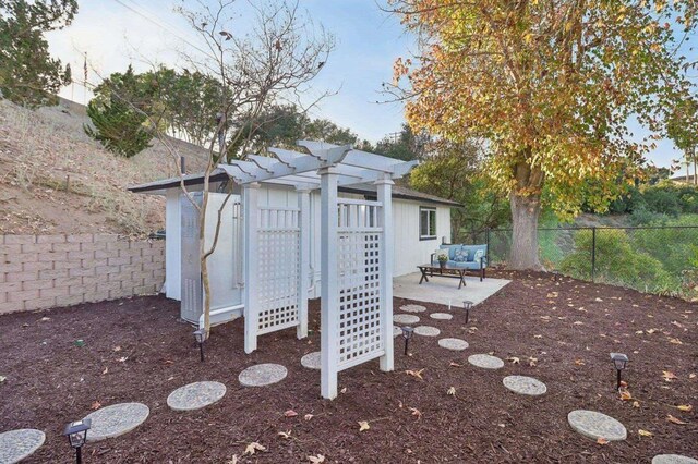 view of patio / terrace with a pergola and an outdoor hangout area