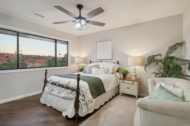 bedroom featuring hardwood / wood-style flooring and ceiling fan