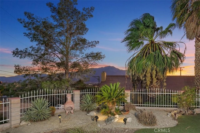 view of front of property with a mountain view