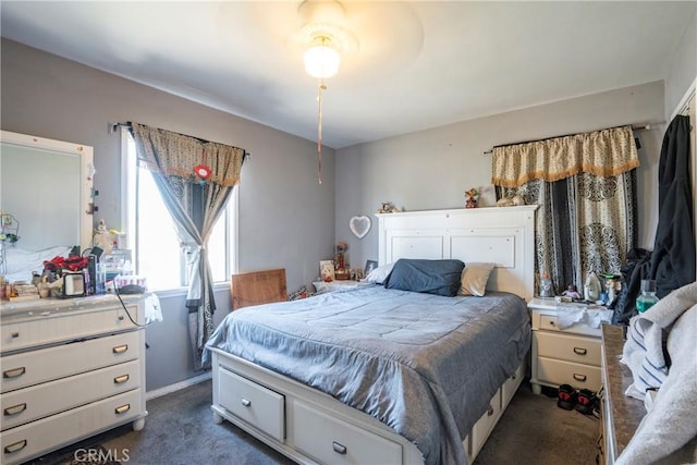 carpeted bedroom with ceiling fan