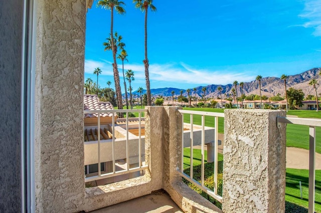 balcony featuring a mountain view