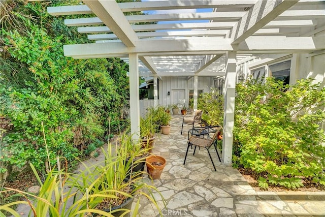 view of patio featuring a pergola