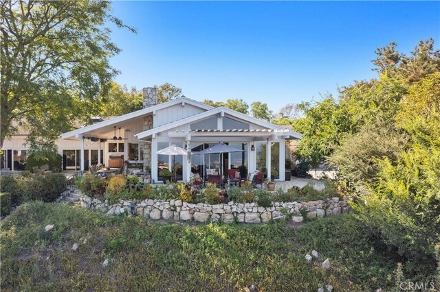 view of property's community featuring a patio