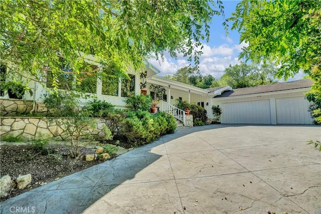 view of front of property with a garage