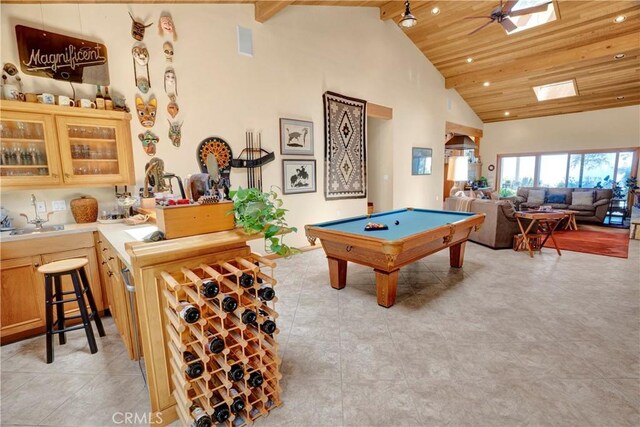 rec room with indoor wet bar, billiards, high vaulted ceiling, wooden ceiling, and beam ceiling