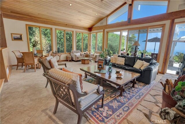 living room featuring high vaulted ceiling, wooden ceiling, and light tile patterned flooring