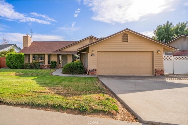 ranch-style home featuring a front yard and a garage