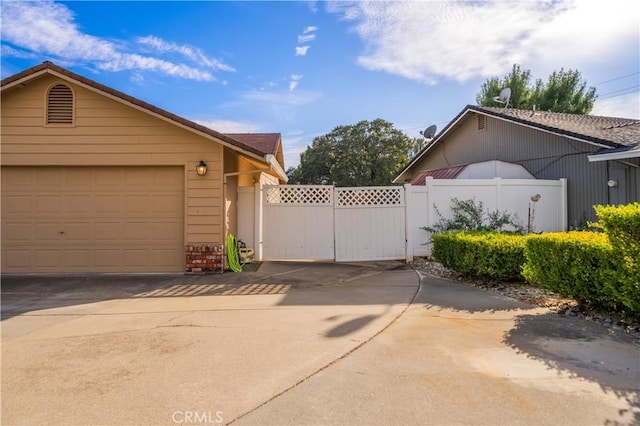 view of property exterior featuring a garage