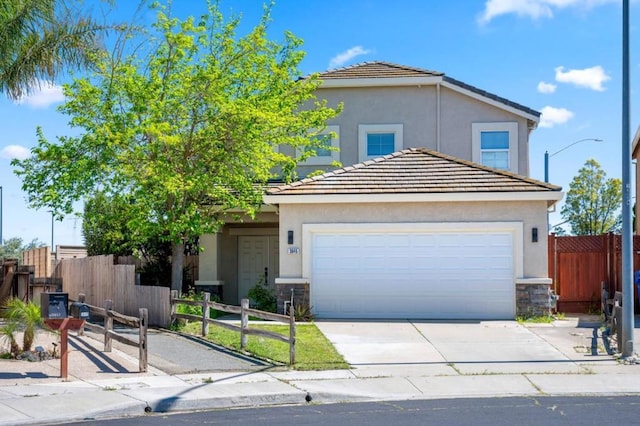 view of property featuring a garage