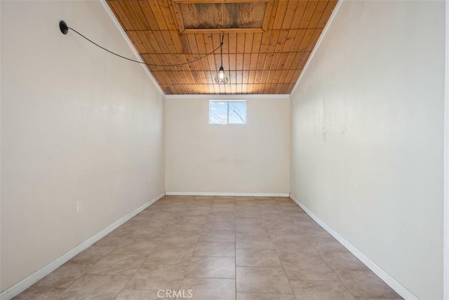 basement with light tile patterned flooring and wood ceiling