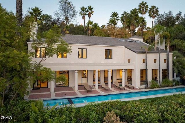 rear view of property with a patio