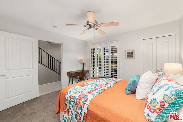 carpeted bedroom with ceiling fan and a closet