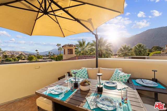 balcony featuring a mountain view