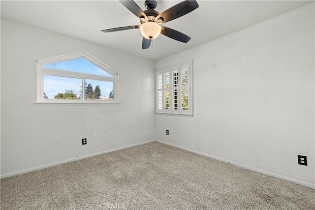 carpeted empty room with ceiling fan