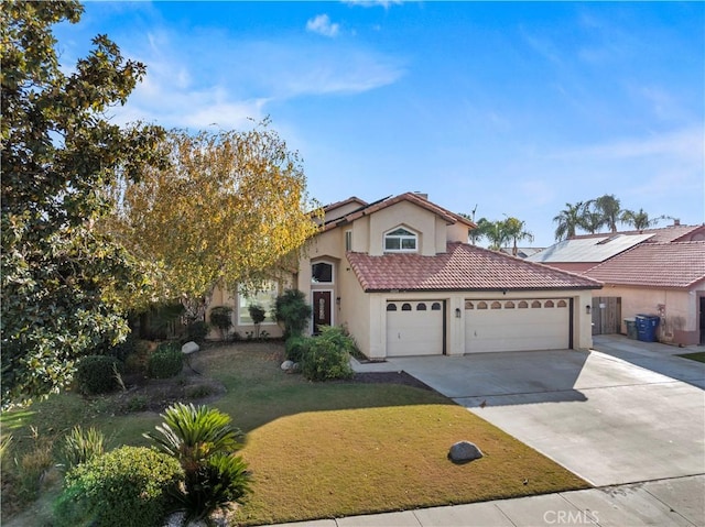 view of front of house with a garage and a front lawn