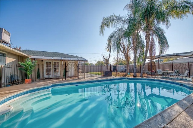 view of pool featuring a patio area