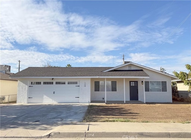 single story home with a garage