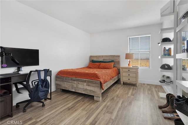 bedroom featuring hardwood / wood-style flooring