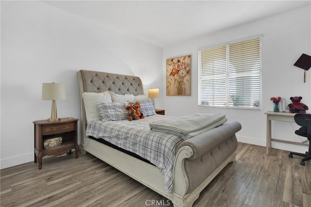 bedroom featuring wood-type flooring