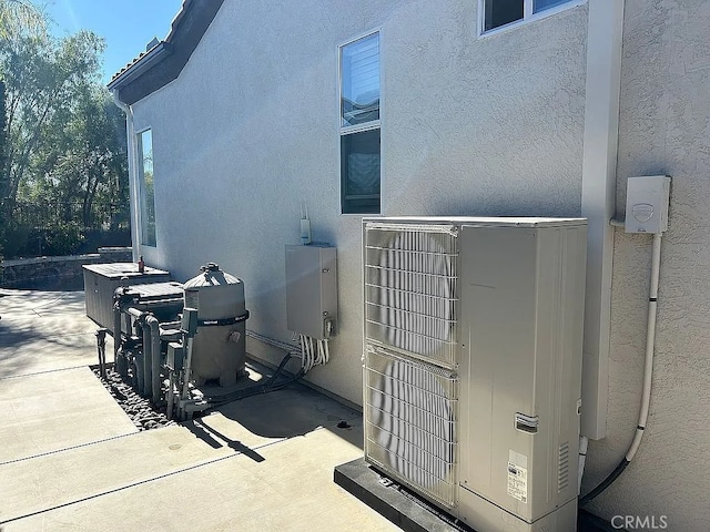 view of property exterior featuring ac unit