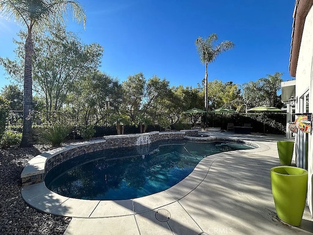 view of pool with a patio