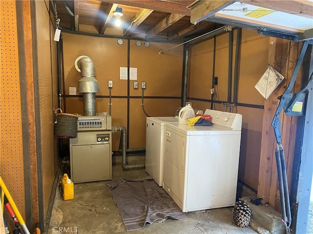 laundry area with washing machine and dryer