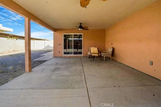 view of patio featuring ceiling fan