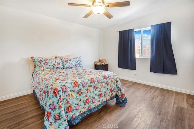 bedroom featuring ceiling fan and wood-type flooring