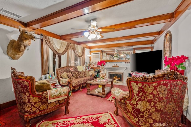 living room with carpet flooring, ceiling fan, beam ceiling, and a wall mounted AC