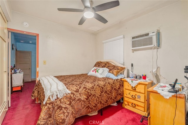 bedroom featuring an AC wall unit, ceiling fan, and dark carpet