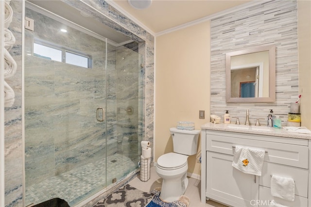 bathroom featuring crown molding, toilet, vanity, and walk in shower