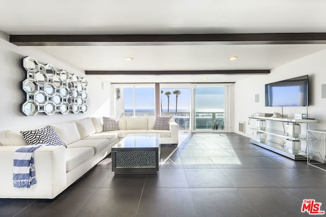 living room with beam ceiling