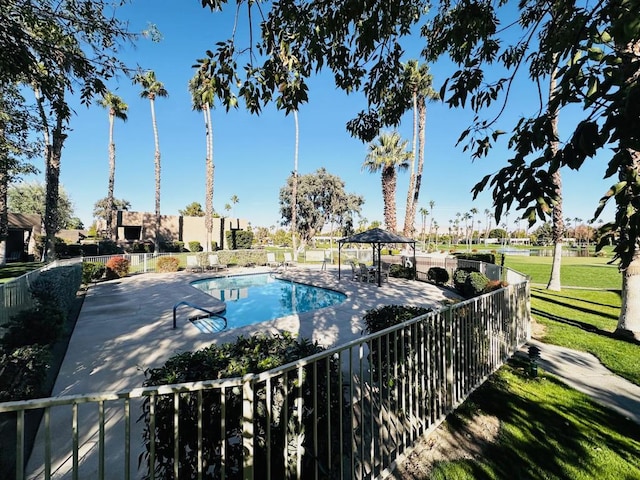 view of pool with a gazebo, a yard, and a patio area