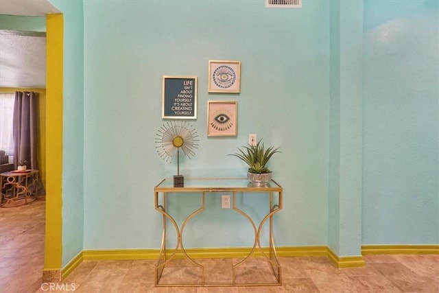 corridor featuring tile patterned floors