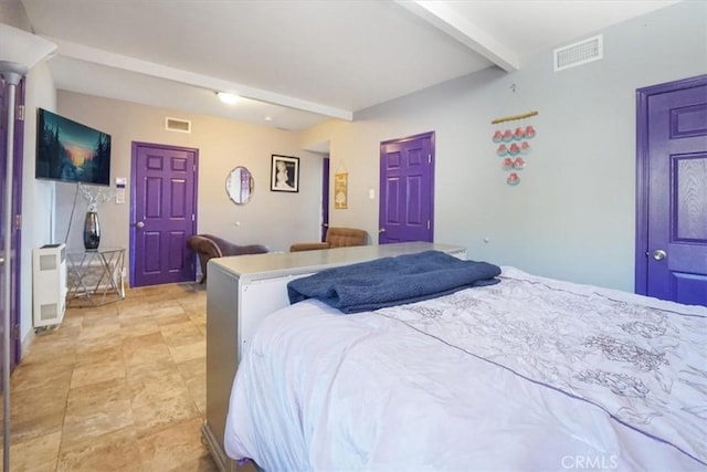 bedroom with beamed ceiling