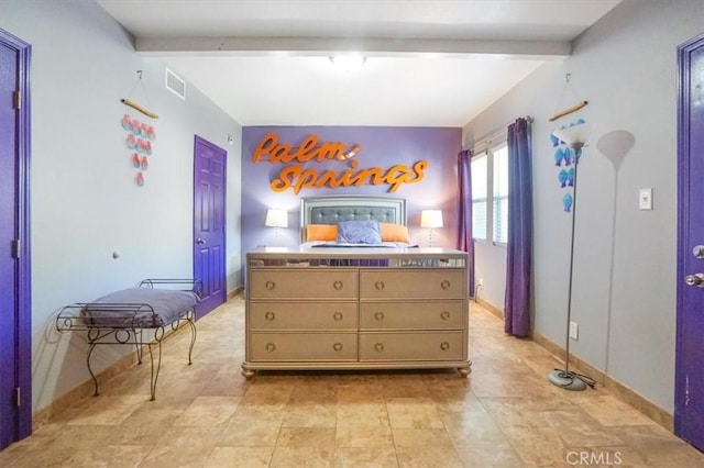 bedroom with beamed ceiling