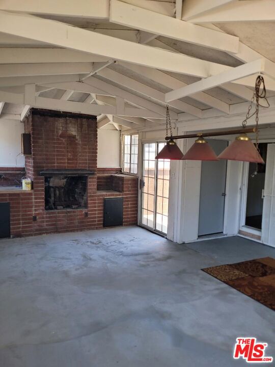 view of patio / terrace with a fireplace