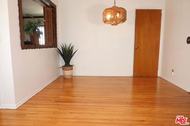 unfurnished room featuring light hardwood / wood-style flooring