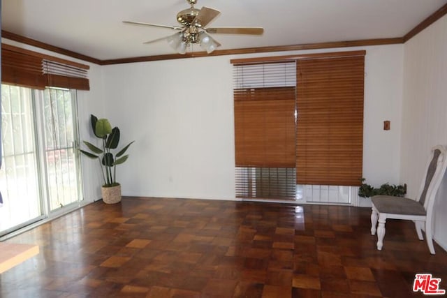 interior space with ceiling fan, dark parquet flooring, and crown molding