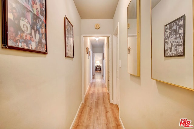 corridor featuring light wood-type flooring