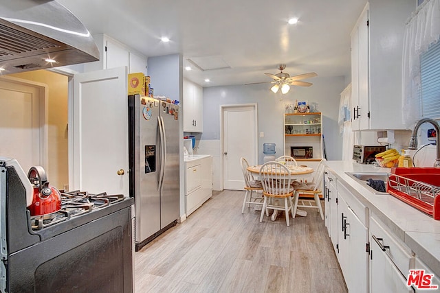 kitchen featuring white cabinets, light hardwood / wood-style floors, island exhaust hood, and stainless steel refrigerator with ice dispenser