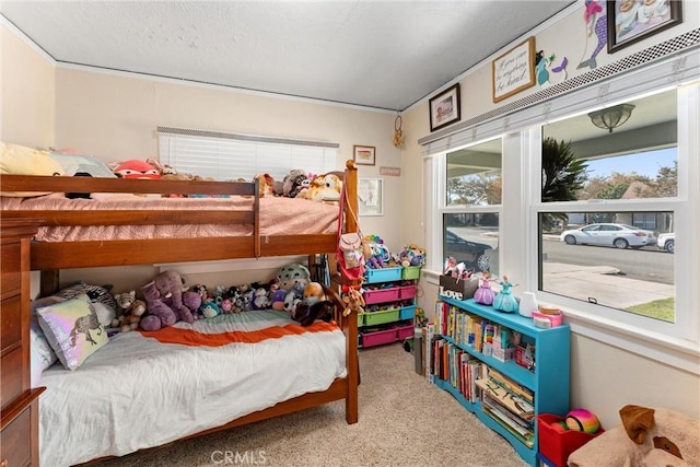 carpeted bedroom with a textured ceiling